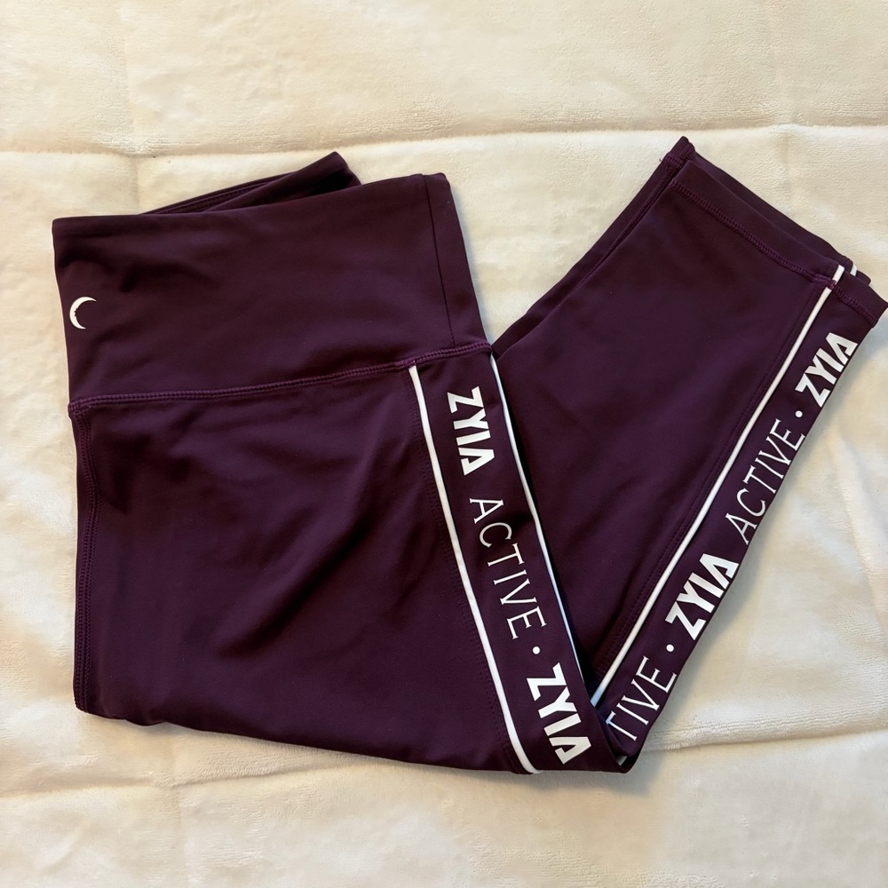 ZYIA Logo Stripe LNT Light N Tight Plum Crop Leggings